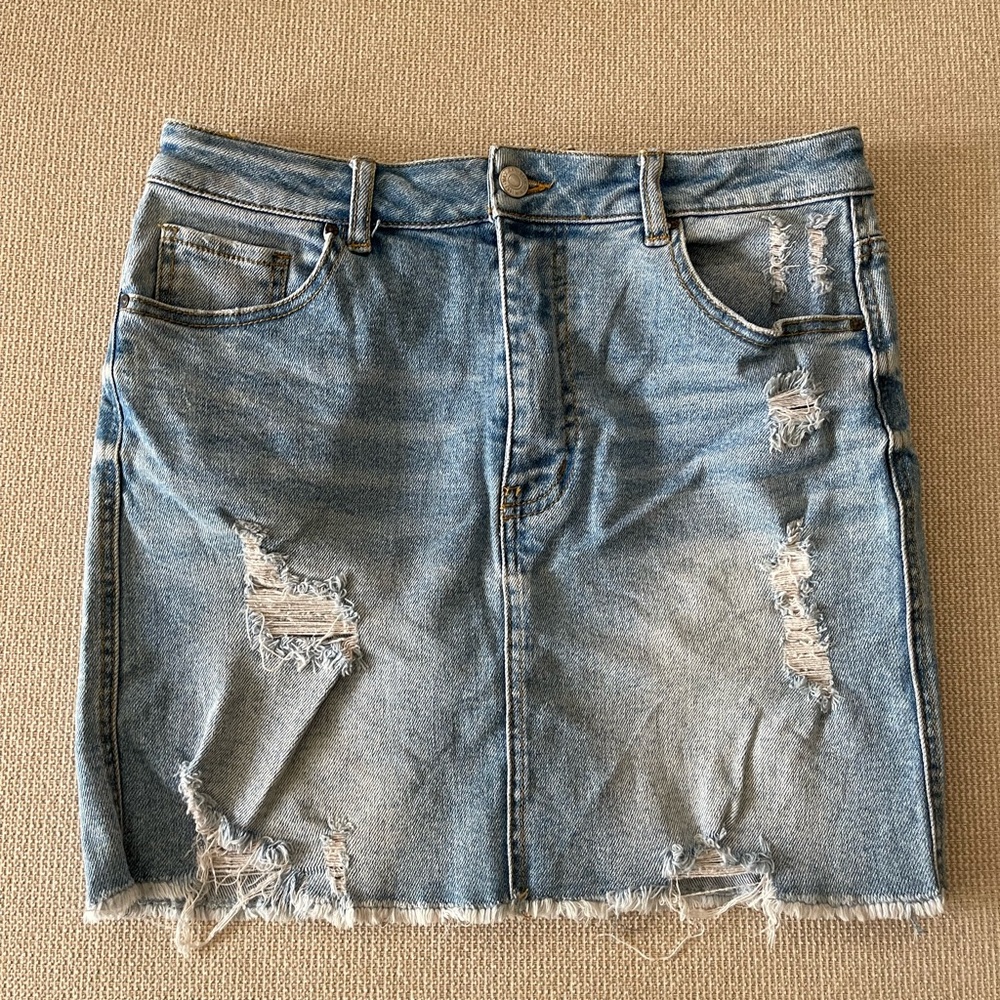 Wax Jean Distressed Mini Skirt